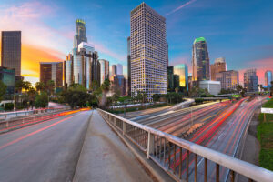 An image of downtown California from the freeway at sunrise.