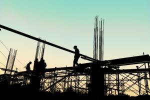 Silhouette-of-construction-past-sunset