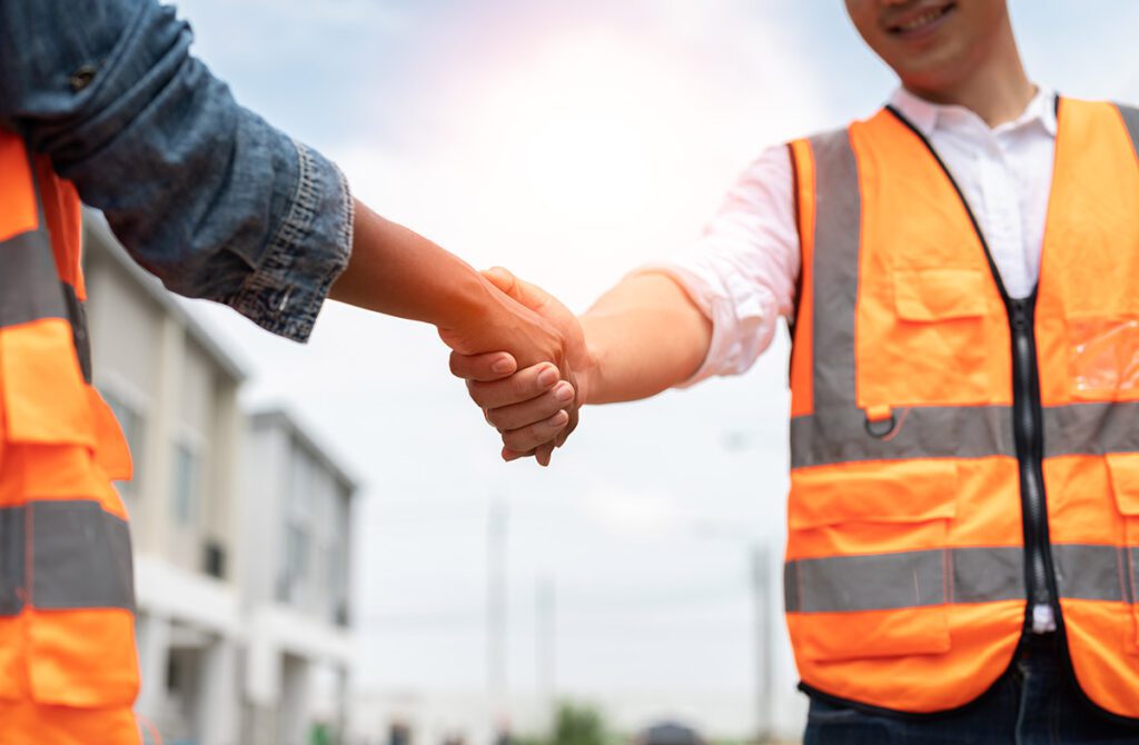 A Subcontractor shaking hands.