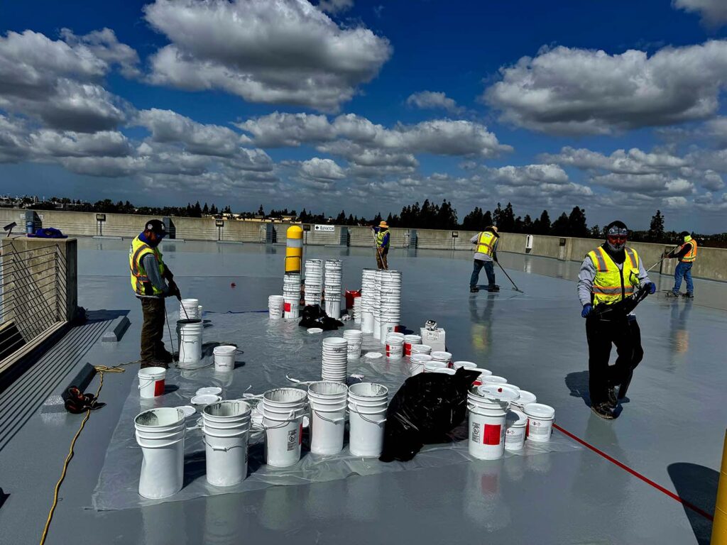 Construction employees working on a parking lot