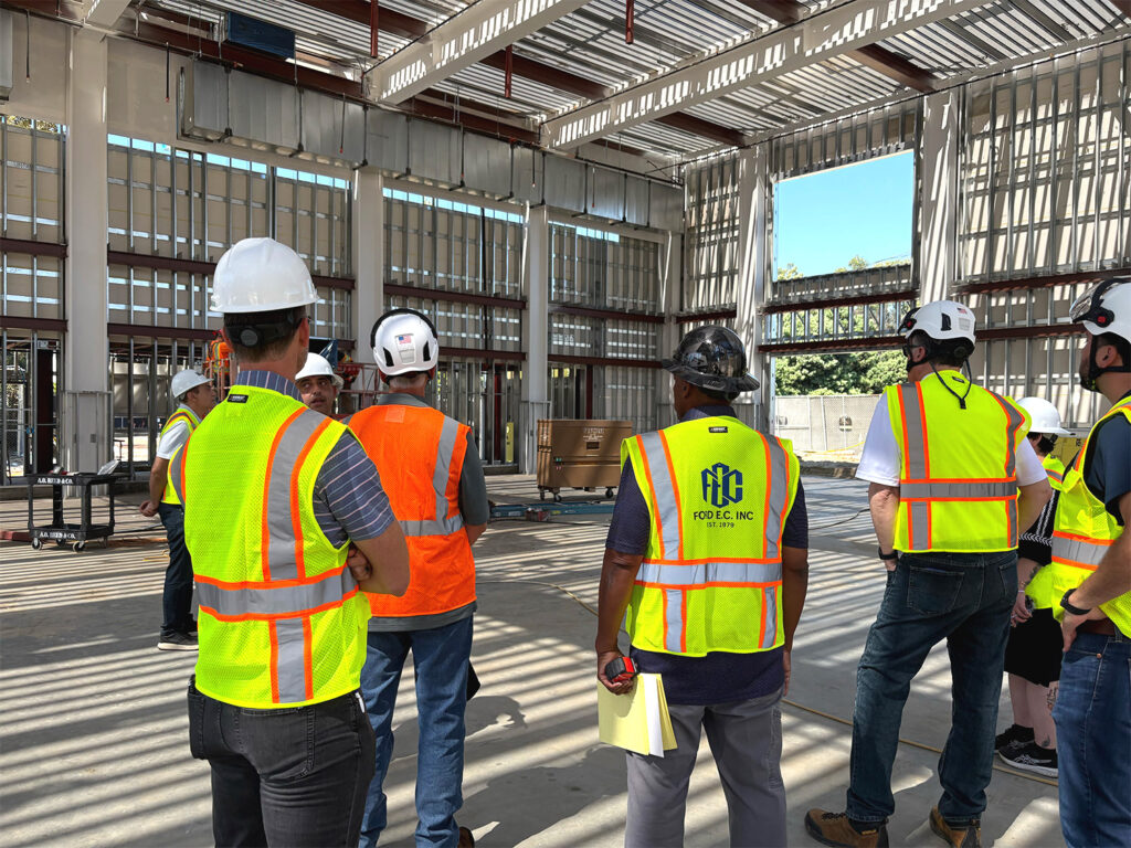 construction employees having a meeting on site